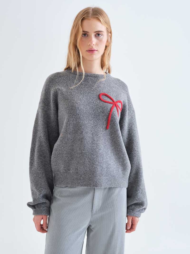 Grey knit jumper with red bow detail | Compañía Fantástica