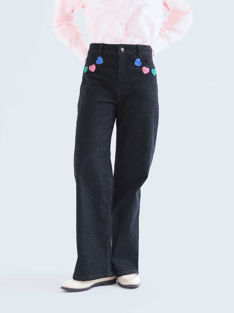 Black denim trousers with Candy print | Compañía Fantástica