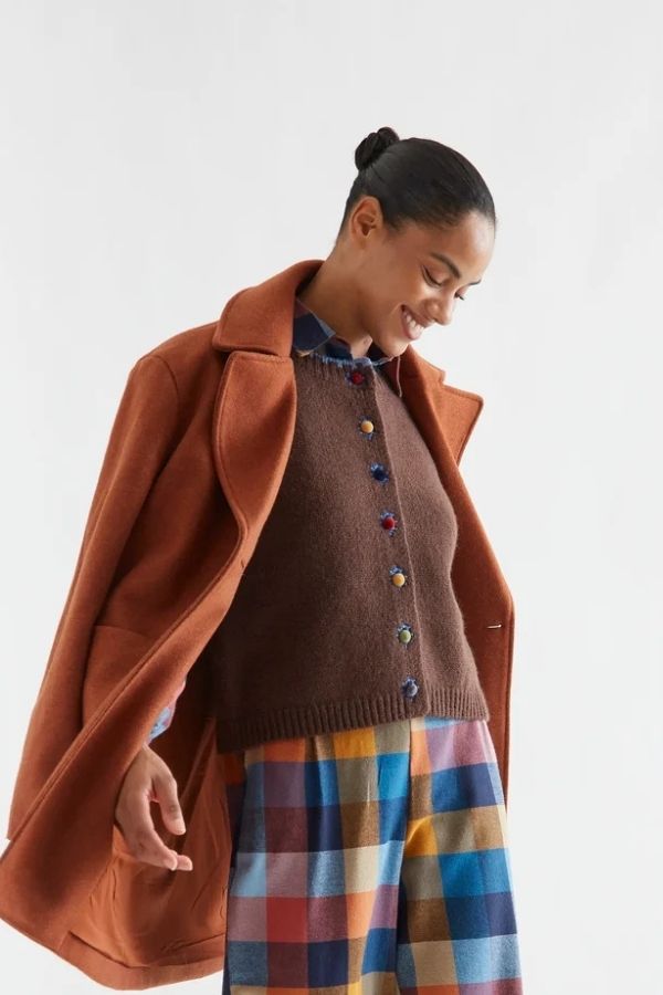 Brown knit vest with multicolored velvet buttons | Compania Fantastica